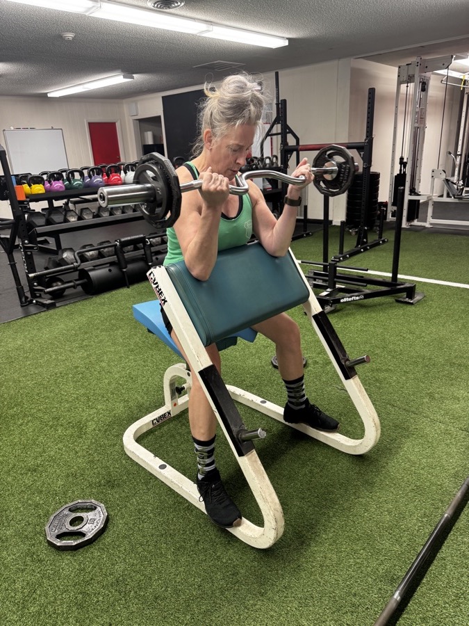 A Ross Fitness member strength training